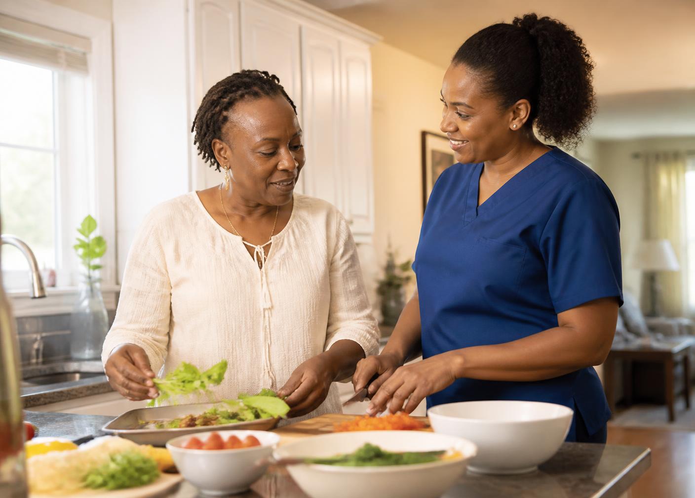 A home health aide helping a woman prepare a meal in her kitchen